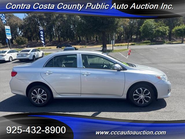 Photo of 2010 Classic Silver Metallic Toyota Corolla