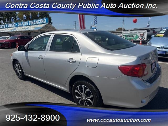 Photo of 2010 Classic Silver Metallic Toyota Corolla