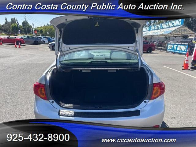 Photo of 2010 Classic Silver Metallic Toyota Corolla