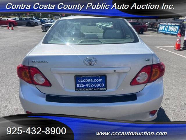 Photo of 2010 Classic Silver Metallic Toyota Corolla