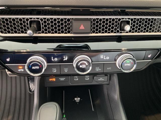 Photo of 2026 Gold Honda Civic Hybrid
