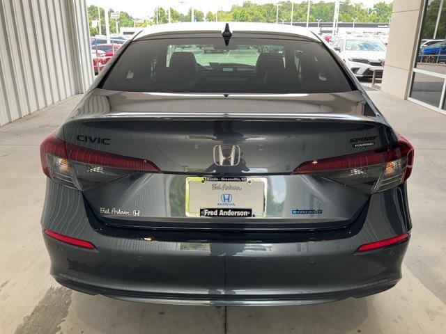 Photo of 2026 Gold Honda Civic Hybrid