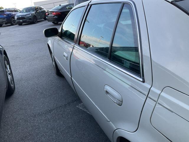 Photo of 2003 Cotillion White Cadillac DeVille