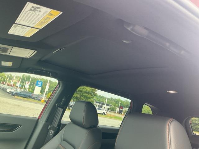 Photo of 2026 Radiant Red Metallic Honda CR-V Hybrid