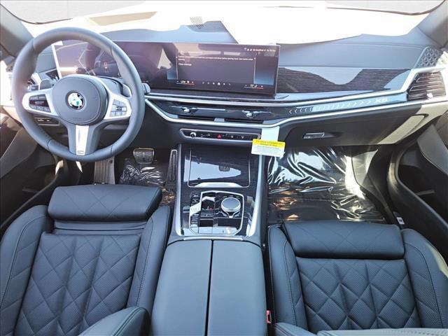 Photo of 2026 Mineral White Metallic BMW X5