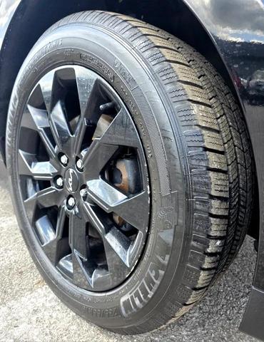 Photo of 2022 Aurora Black Kia Carnival
