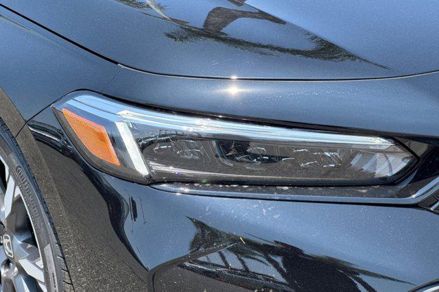 Photo of 2026 Crystal Black Pearl Honda Civic Hybrid