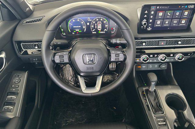 Photo of 2026 Crystal Black Pearl Honda Civic Hybrid