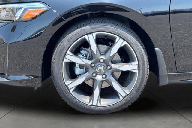 Photo of 2026 Crystal Black Pearl Honda Civic Hybrid