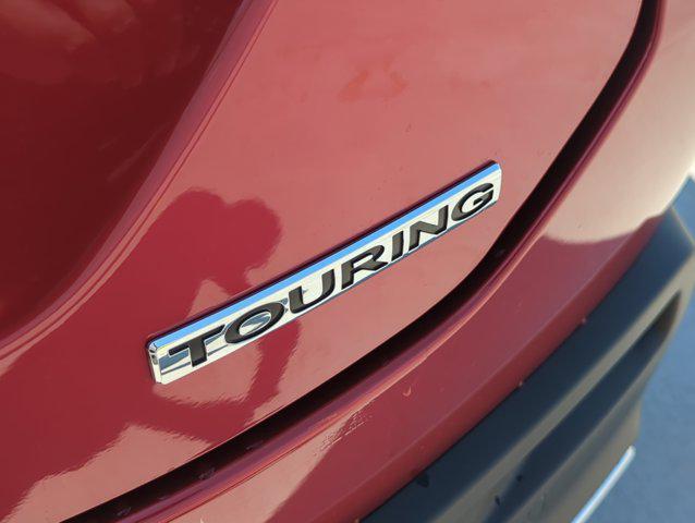 Photo of 2025 Radiant Red Metallic II Honda Pilot