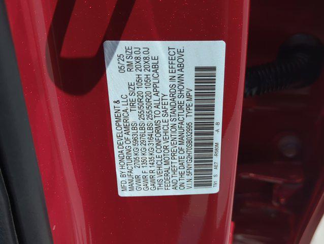 Photo of 2025 Radiant Red Metallic II Honda Pilot