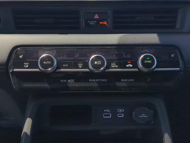 Photo of 2025 Radiant Red Metallic II Honda Pilot
