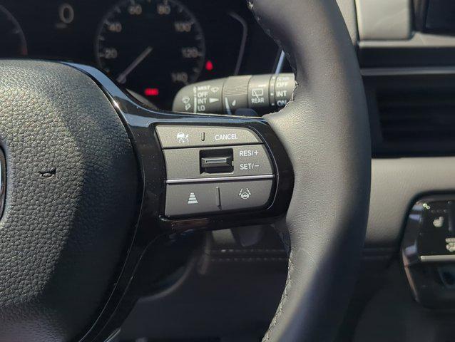 Photo of 2025 Radiant Red Metallic II Honda Pilot