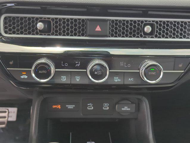 Photo of 2025 Blue Lagoon Pearl Honda Civic Hybrid
