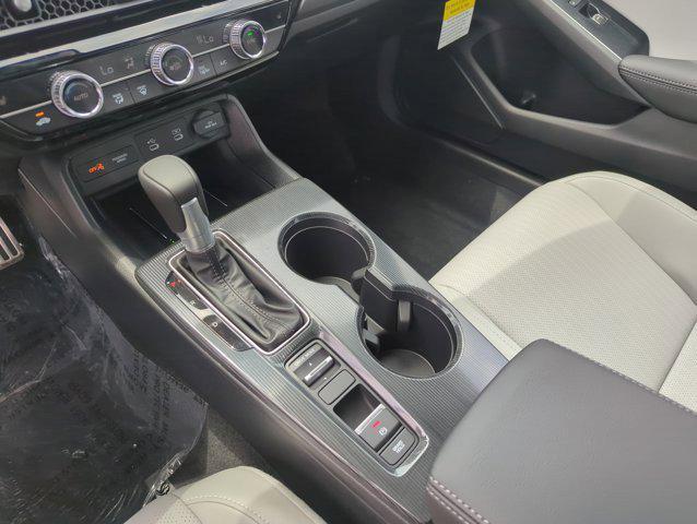 Photo of 2025 Blue Lagoon Pearl Honda Civic Hybrid