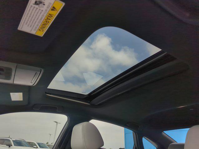 Photo of 2025 Blue Lagoon Pearl Honda Civic Hybrid