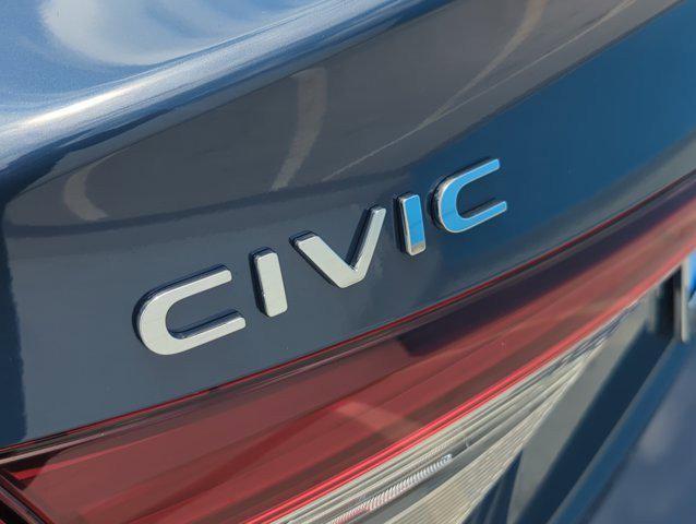 Photo of 2025 Blue Lagoon Pearl Honda Civic Hybrid