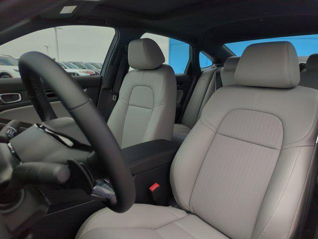 Photo of 2025 Blue Lagoon Pearl Honda Civic Hybrid