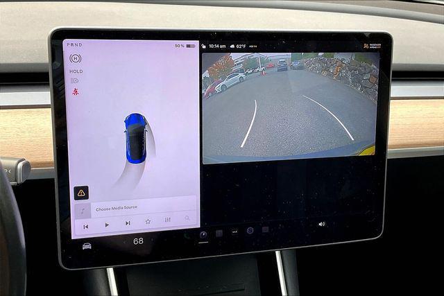 Photo of 2018 Deep Blue Metallic Tesla Model 3