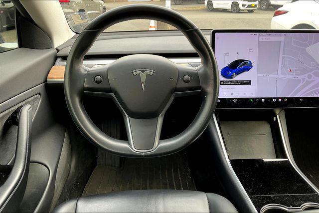 Photo of 2018 Deep Blue Metallic Tesla Model 3