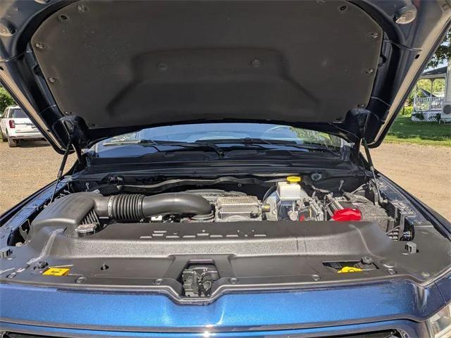 Photo of 2021 Patriot Blue Pearlcoat RAM 1500