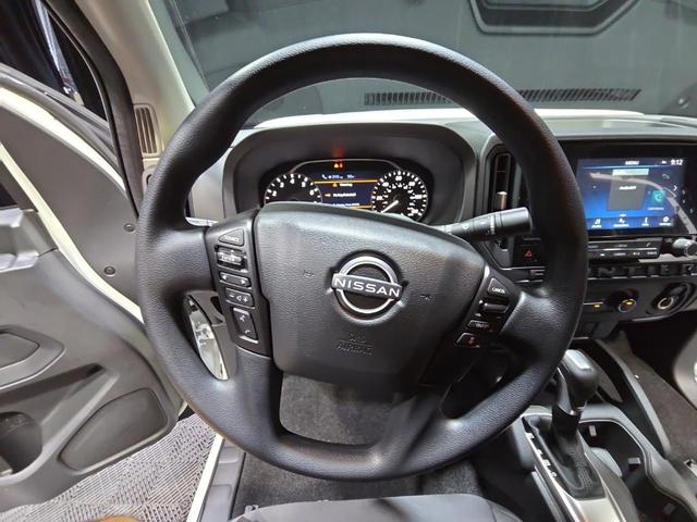 Photo of 2025 Glacier White Nissan Frontier