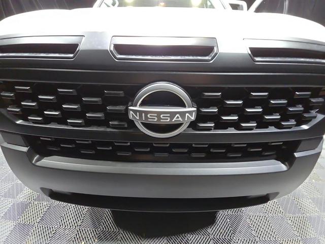 Photo of 2025 Glacier White Nissan Frontier