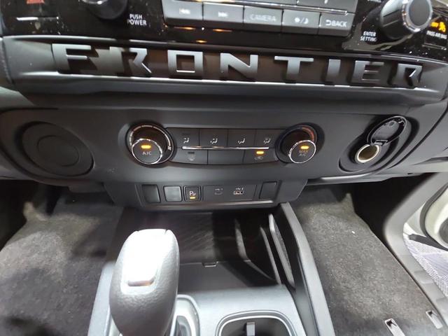Photo of 2025 Glacier White Nissan Frontier