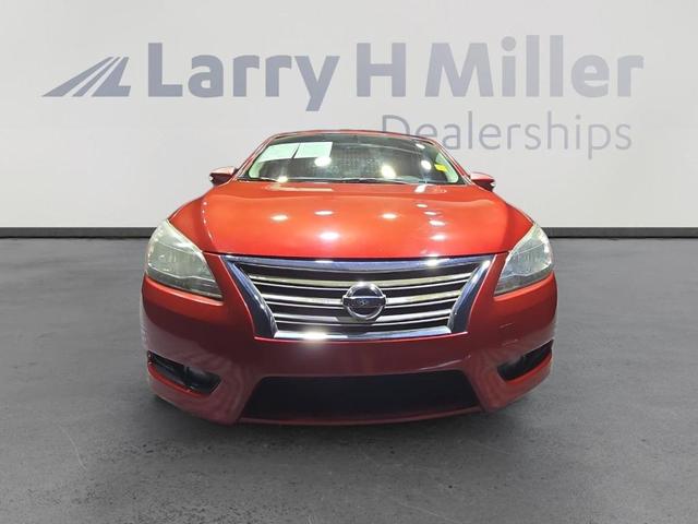 Photo of 2013 Red Brick Nissan Sentra