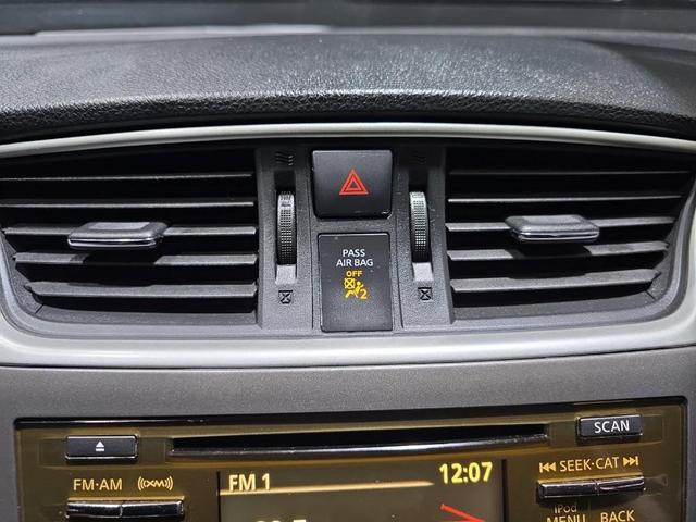 Photo of 2013 Red Brick Nissan Sentra