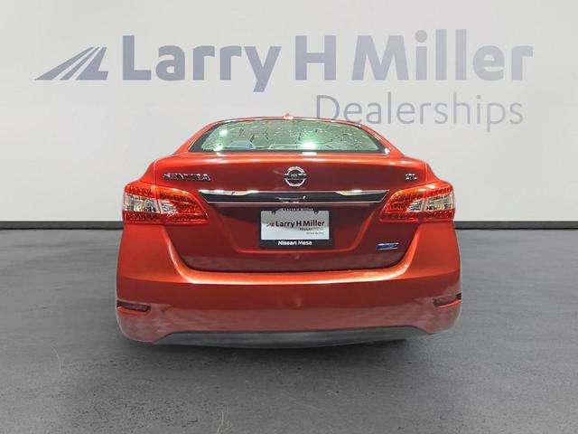 Photo of 2013 Red Brick Nissan Sentra