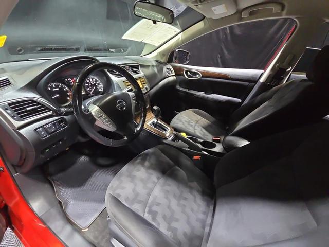 Photo of 2013 Red Brick Nissan Sentra