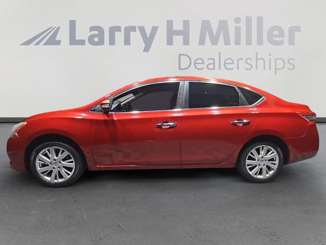 Photo of 2013 Red Brick Nissan Sentra
