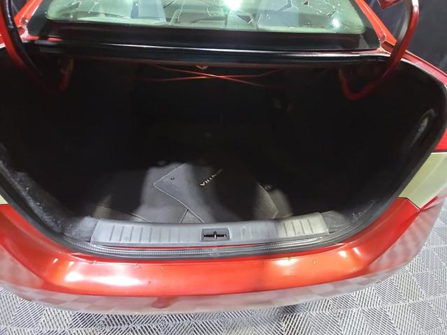 Photo of 2013 Red Brick Nissan Sentra