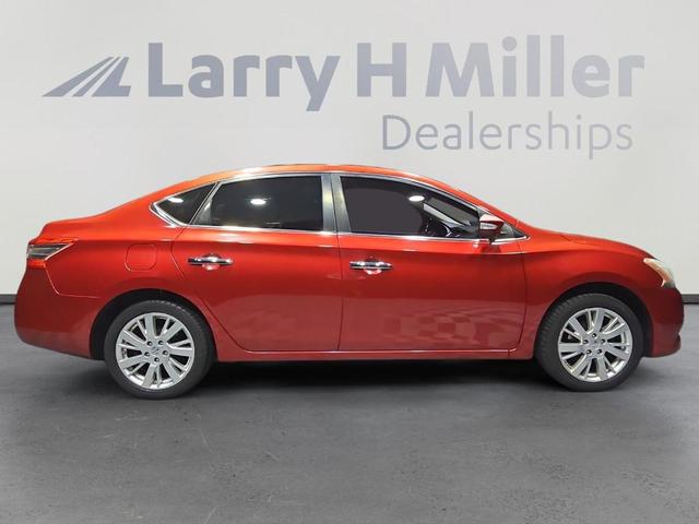 Photo of 2013 Red Brick Nissan Sentra