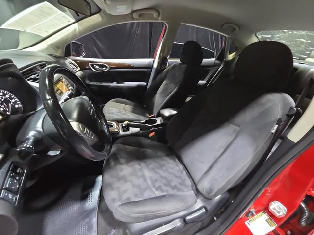 Photo of 2013 Red Brick Nissan Sentra