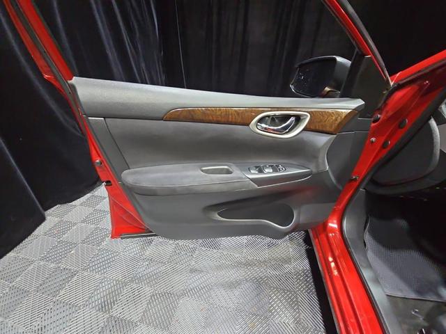 Photo of 2013 Red Brick Nissan Sentra