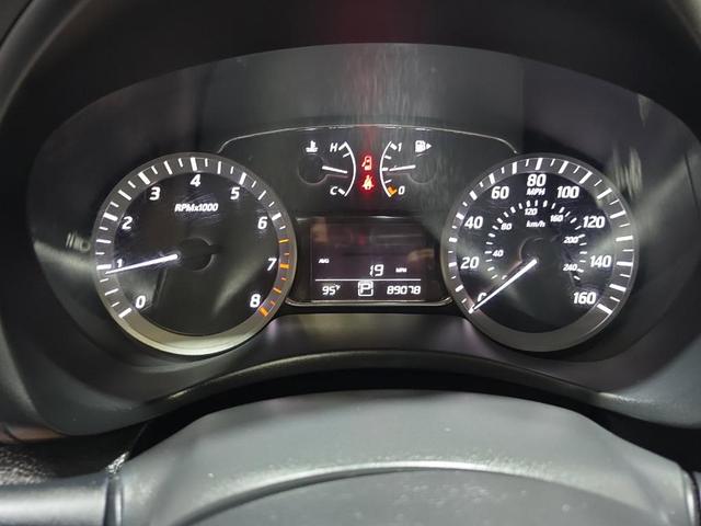 Photo of 2013 Red Brick Nissan Sentra