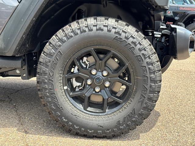 Photo of 2025 Granite Crystal Metallic Clearcoat Jeep Wrangler 4xe