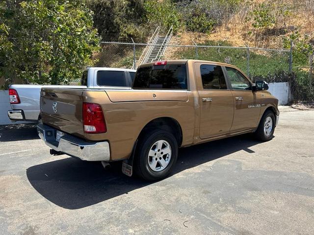 Photo of 2011 Saddle Brown Pearlcoat Dodge Ram 1500