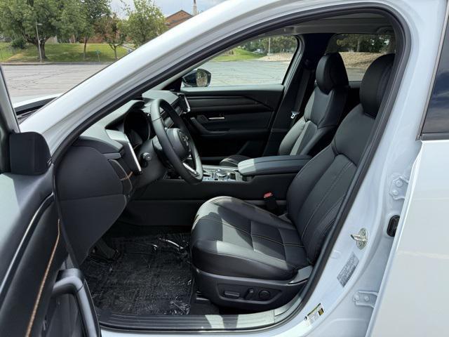 Photo of 2025 Wind Chill Pearl Mazda CX-50 Hybrid