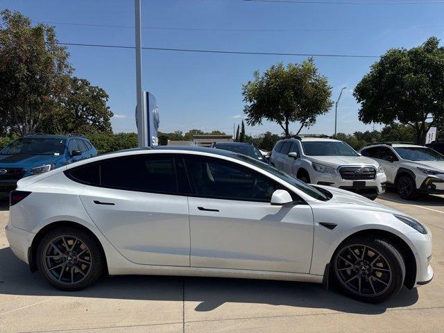 Photo of 2021 Pearl White Multi Tesla Model 3