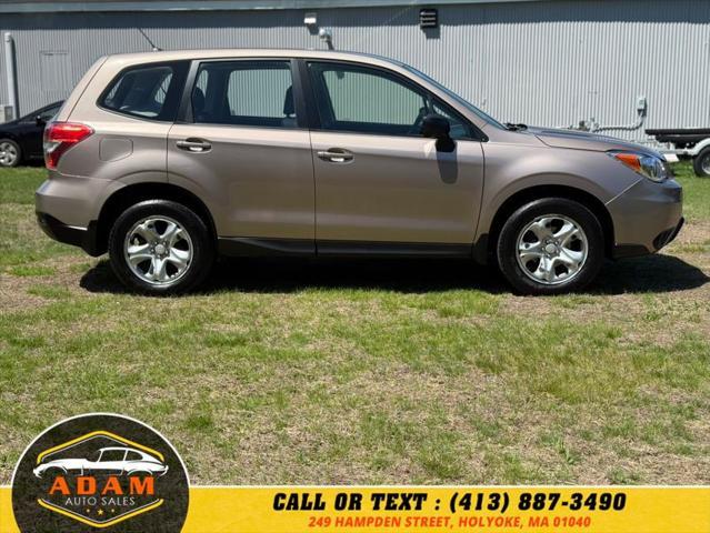 Photo of 2014 Brown Subaru Forester