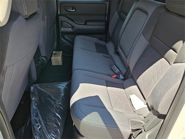 Photo of 2025 Glacier White Nissan Frontier