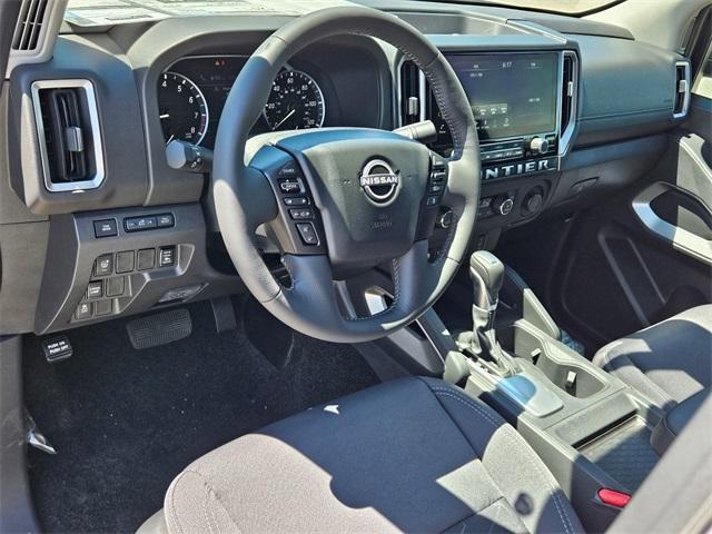 Photo of 2025 Glacier White Nissan Frontier