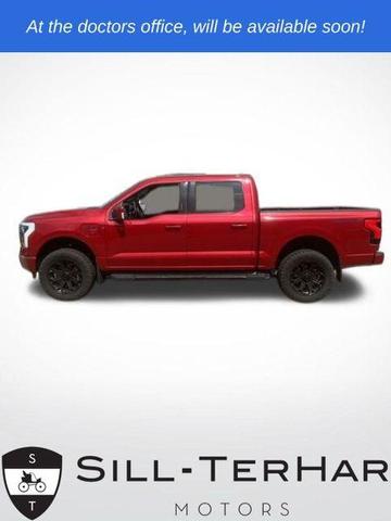 Photo of 2022 Rapid Red Metallic Tinted Clearcoat Ford F-150 Lightning