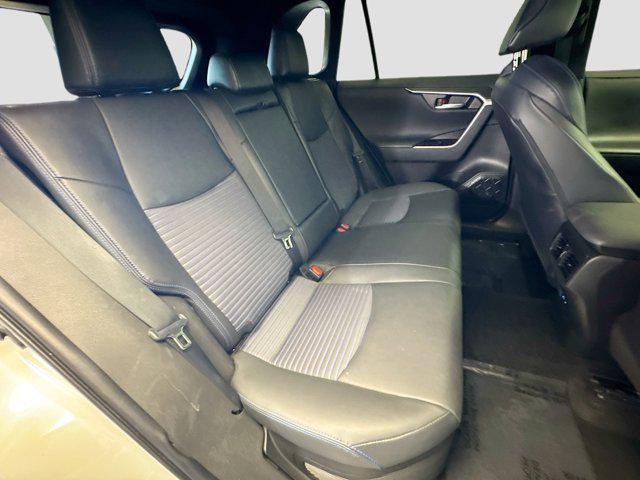 Photo of 2022 Blizzard Pearl/Midnight Black Metallic Toyota RAV4 Hybrid