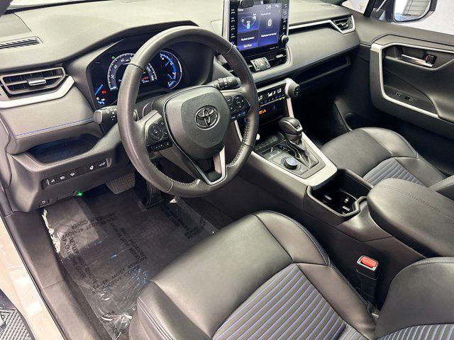 Photo of 2022 Blizzard Pearl/Midnight Black Metallic Toyota RAV4 Hybrid