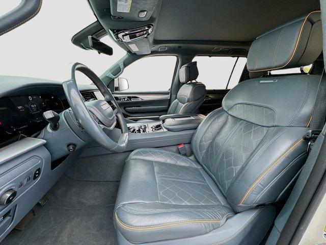 Photo of 2022 Luxury White Pearlcoat Jeep Grand Wagoneer