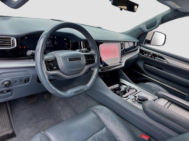Photo of 2022 Luxury White Pearlcoat Jeep Grand Wagoneer
